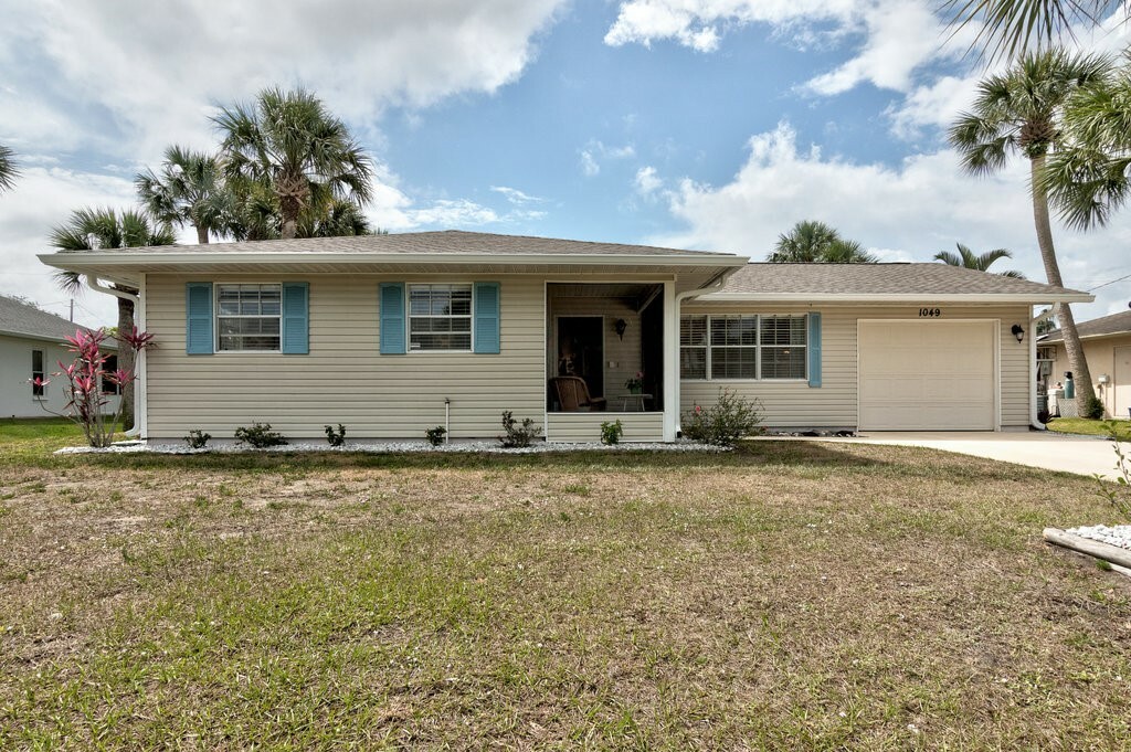 Property Photo: 1049 Carnation Drive FL 32958