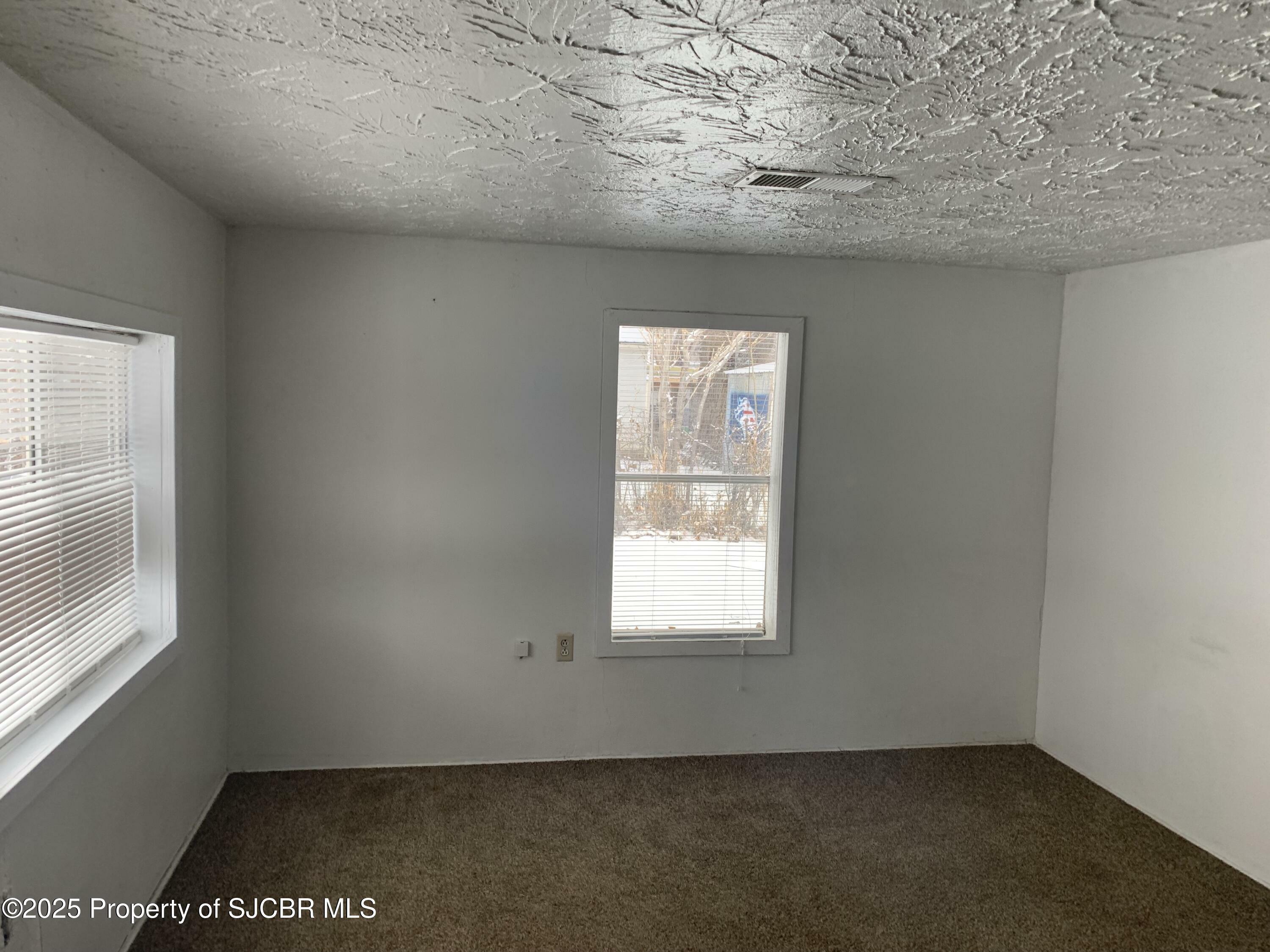 Property Photo: 323 W Main Street NM 87413