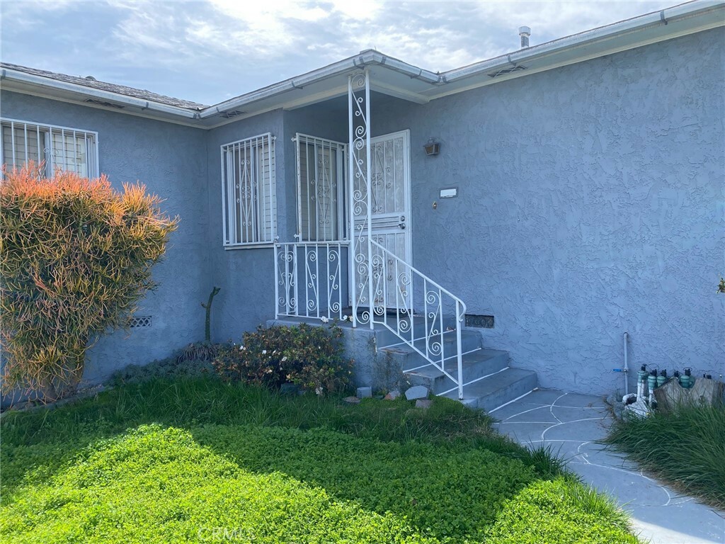 Property Photo: 8802 S Wilton Place CA 90047