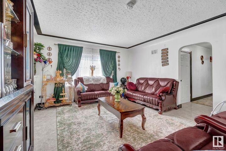 Property Photo:  11306 109A Avenue NW  AB T5H 1G8 