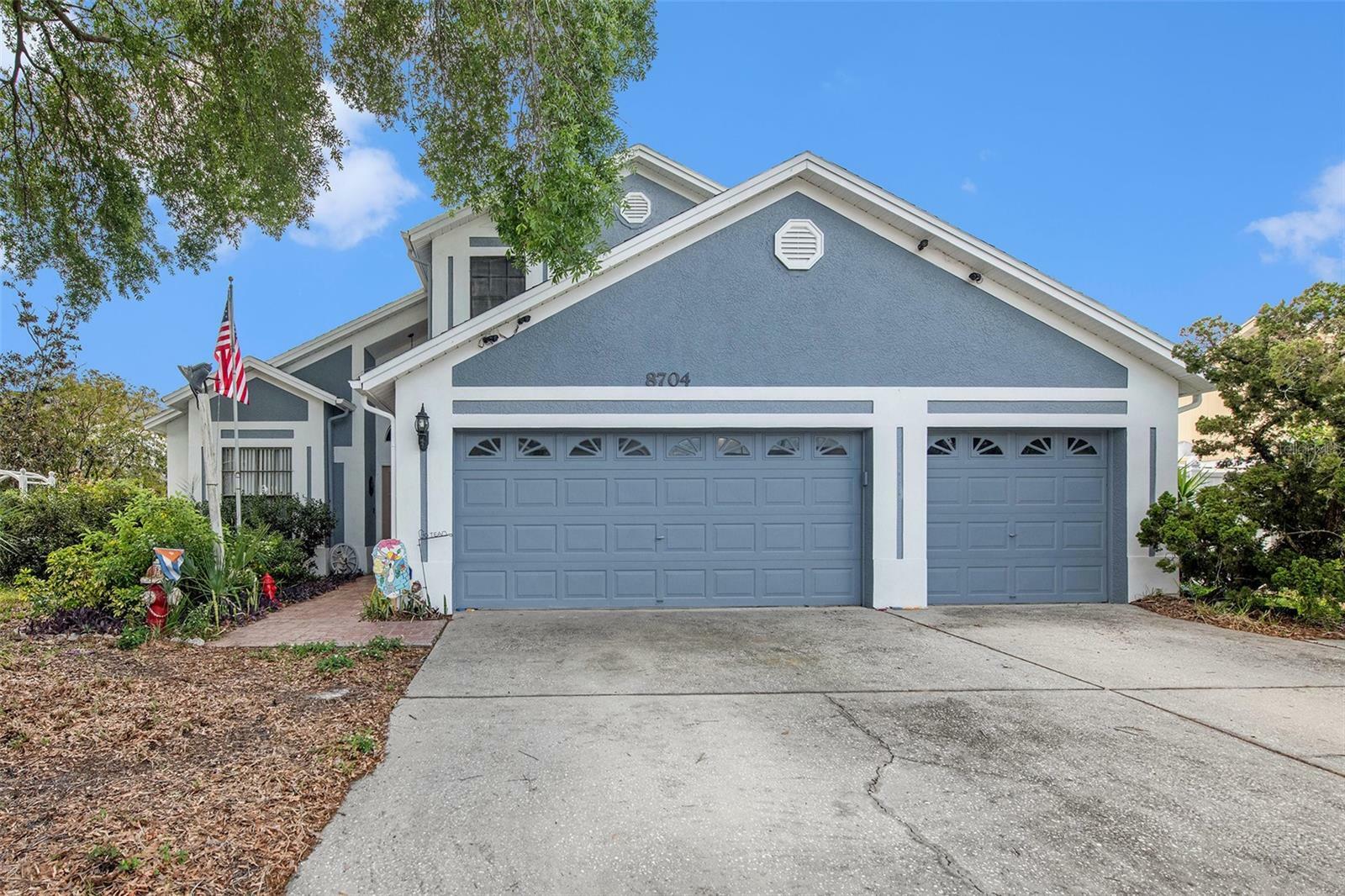 Property Photo: 8704 Tarrington Place FL 33635