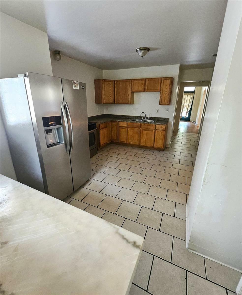 Property Photo: 3825 S Grand Boulevard MO 63118