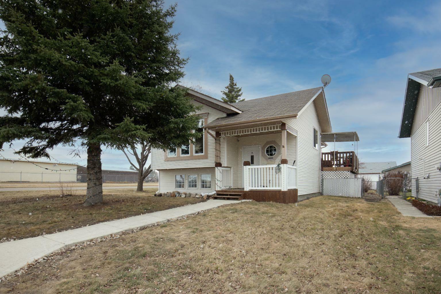 Property Photo: 5203 42 Street AB T4G 1K3