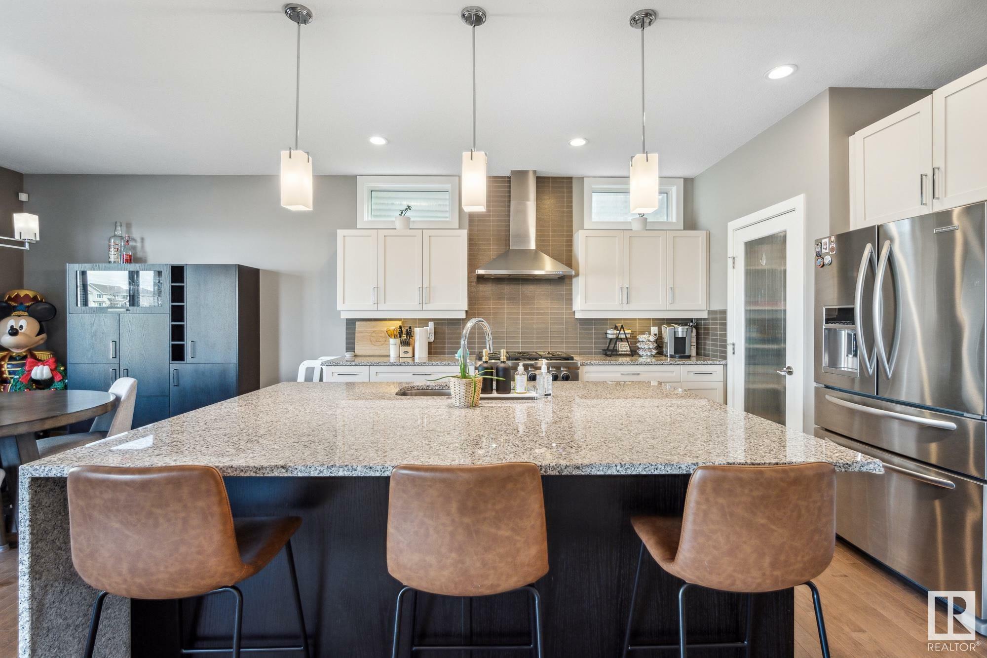Property Photo: 2135 Glenridding Way SW AB T6W 2H4