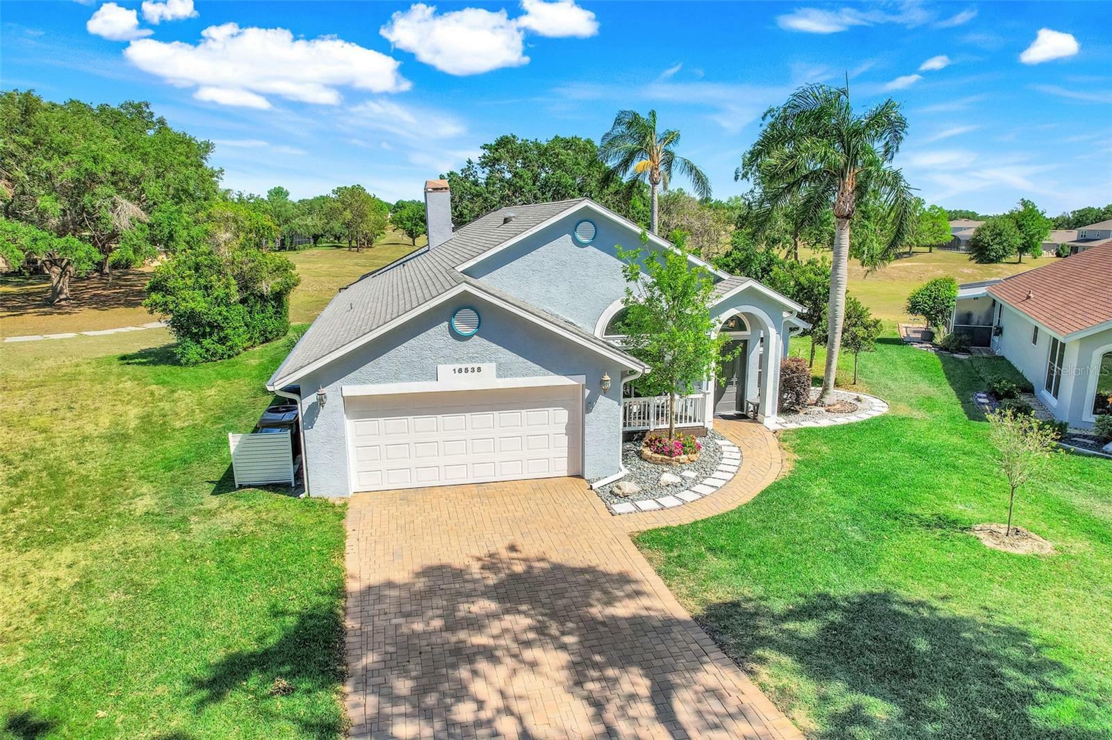 Property Photo: 16538 Rockwell Heights Ln FL 34711