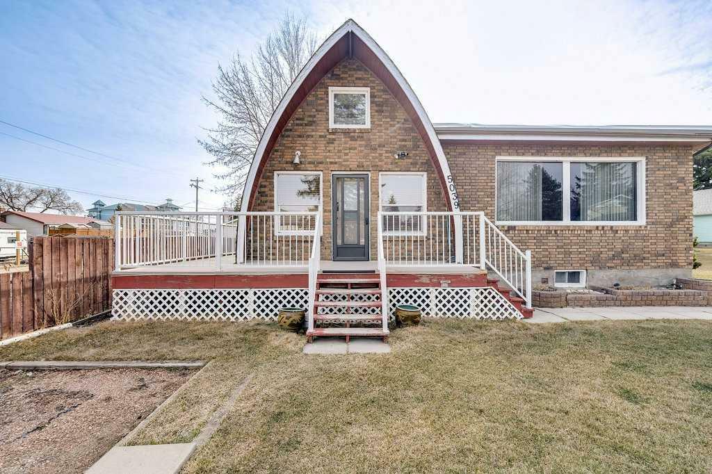 Property Photo: 5039 52 Street AB T4S 1E4