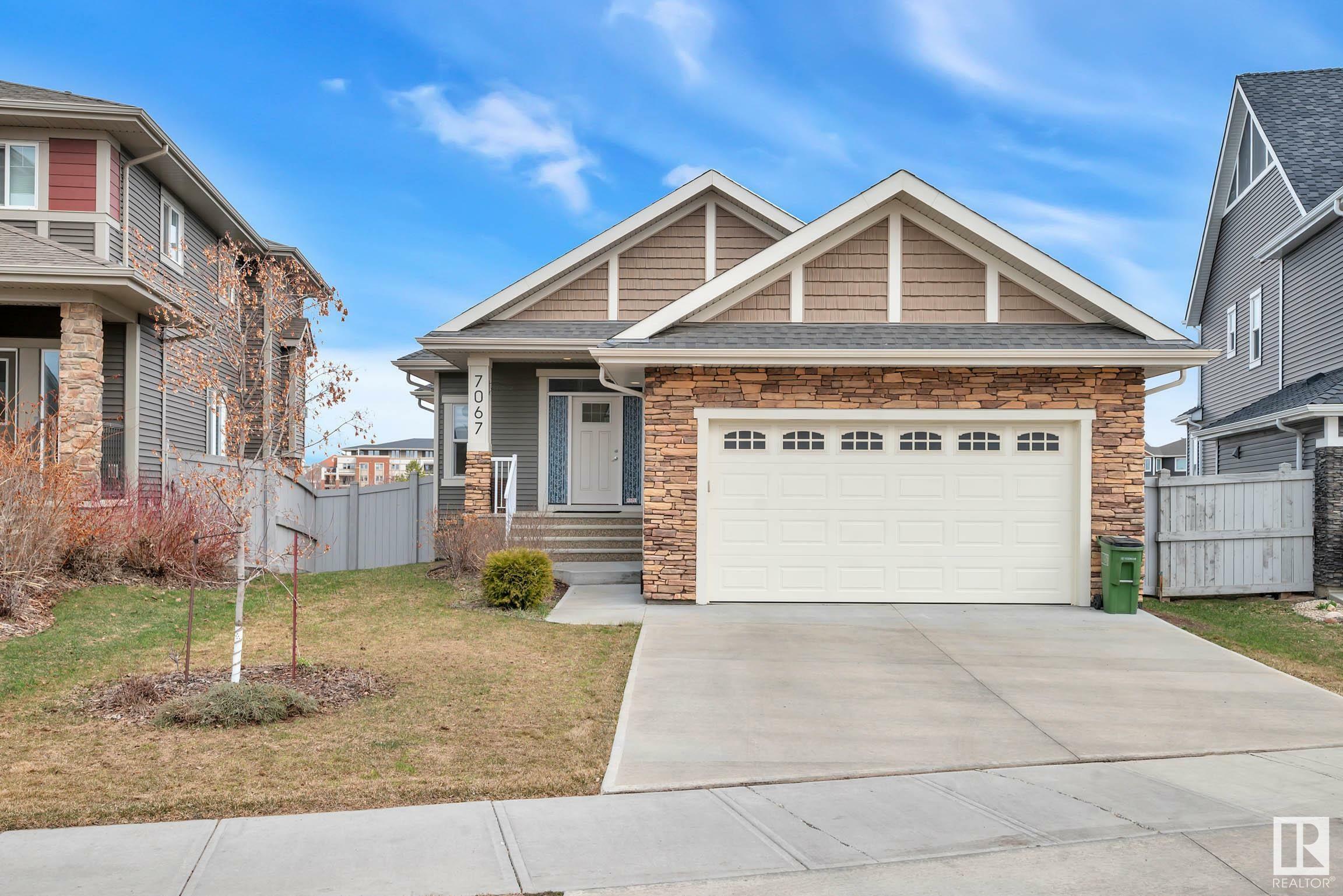 Property Photo: 7067 Newson Road NW AB T5E 6V6