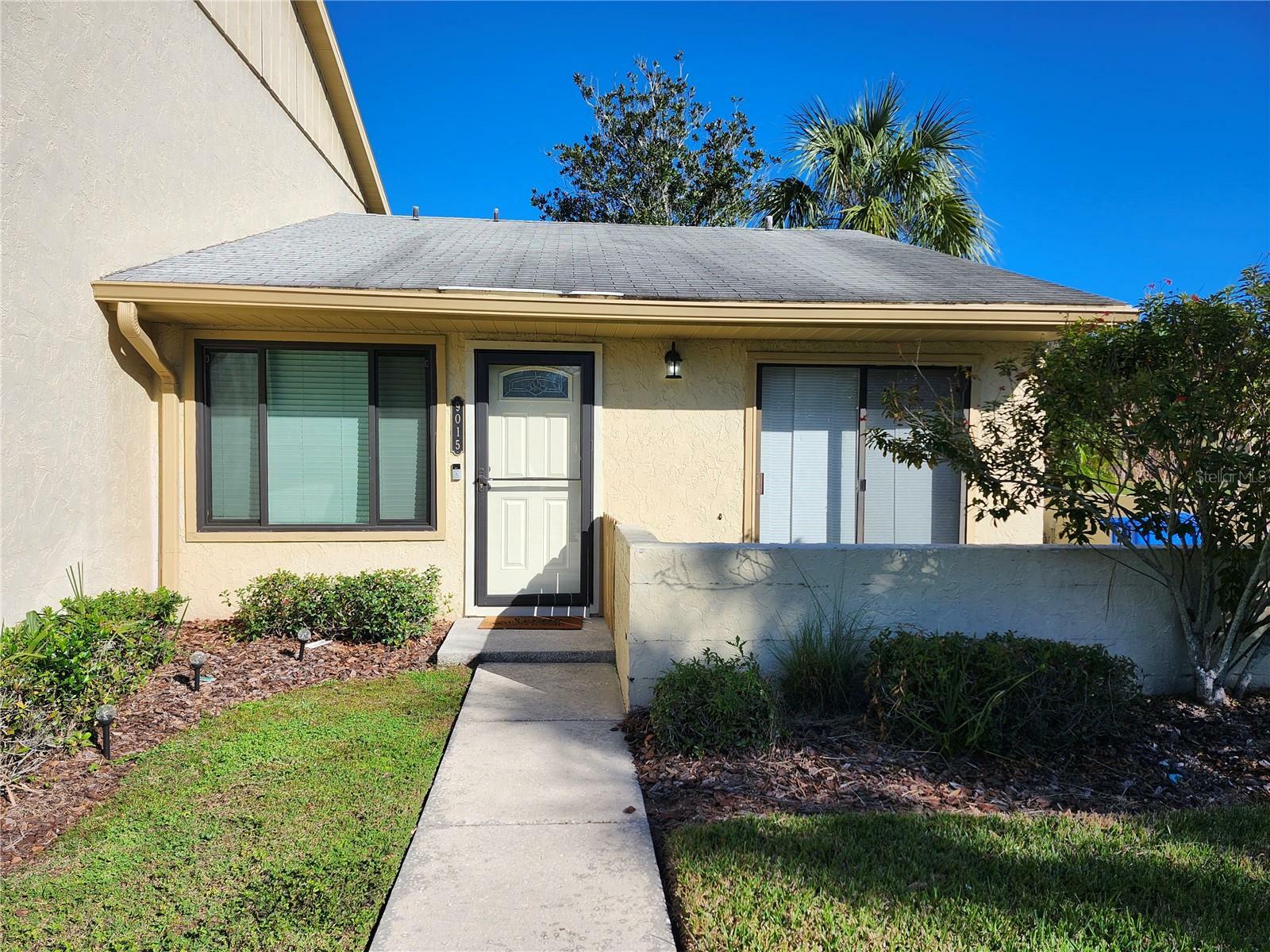 Property Photo: 9015 Pebble Creek Drive FL 33647