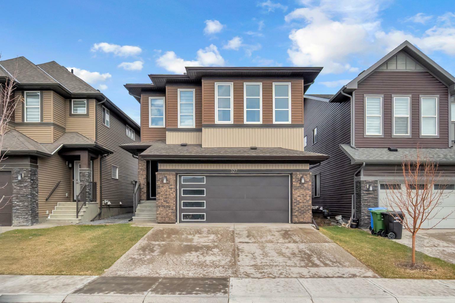 Property Photo: 327 Savanna Way NE AB T3J 2H6