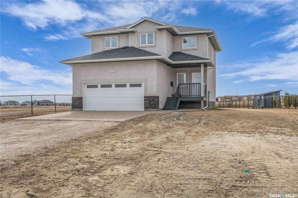 Property Photo: 372 Emerald Park Road SK S4L 0E7