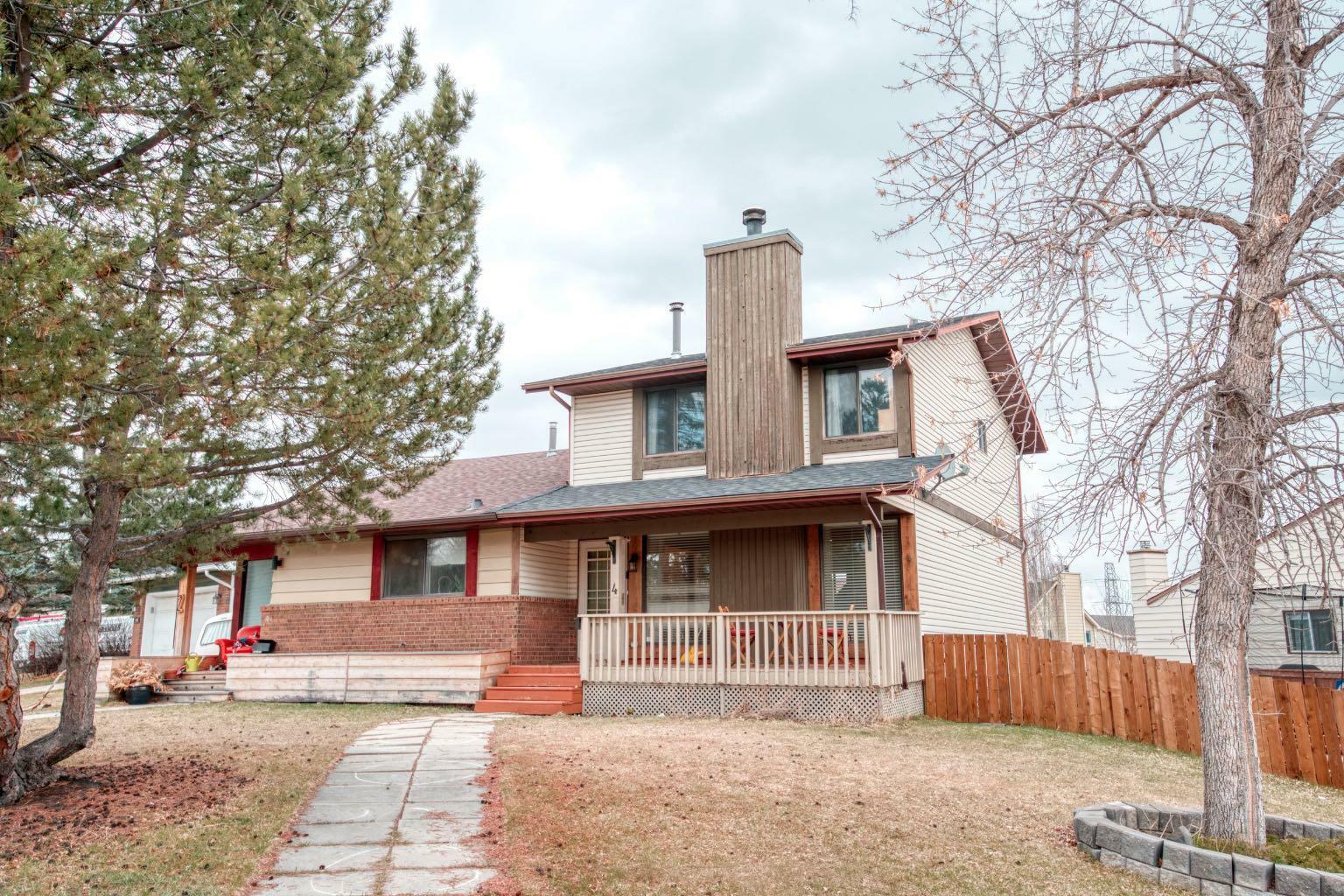 Property Photo: 4 Strathcona Crescent SW AB T3H 1L1