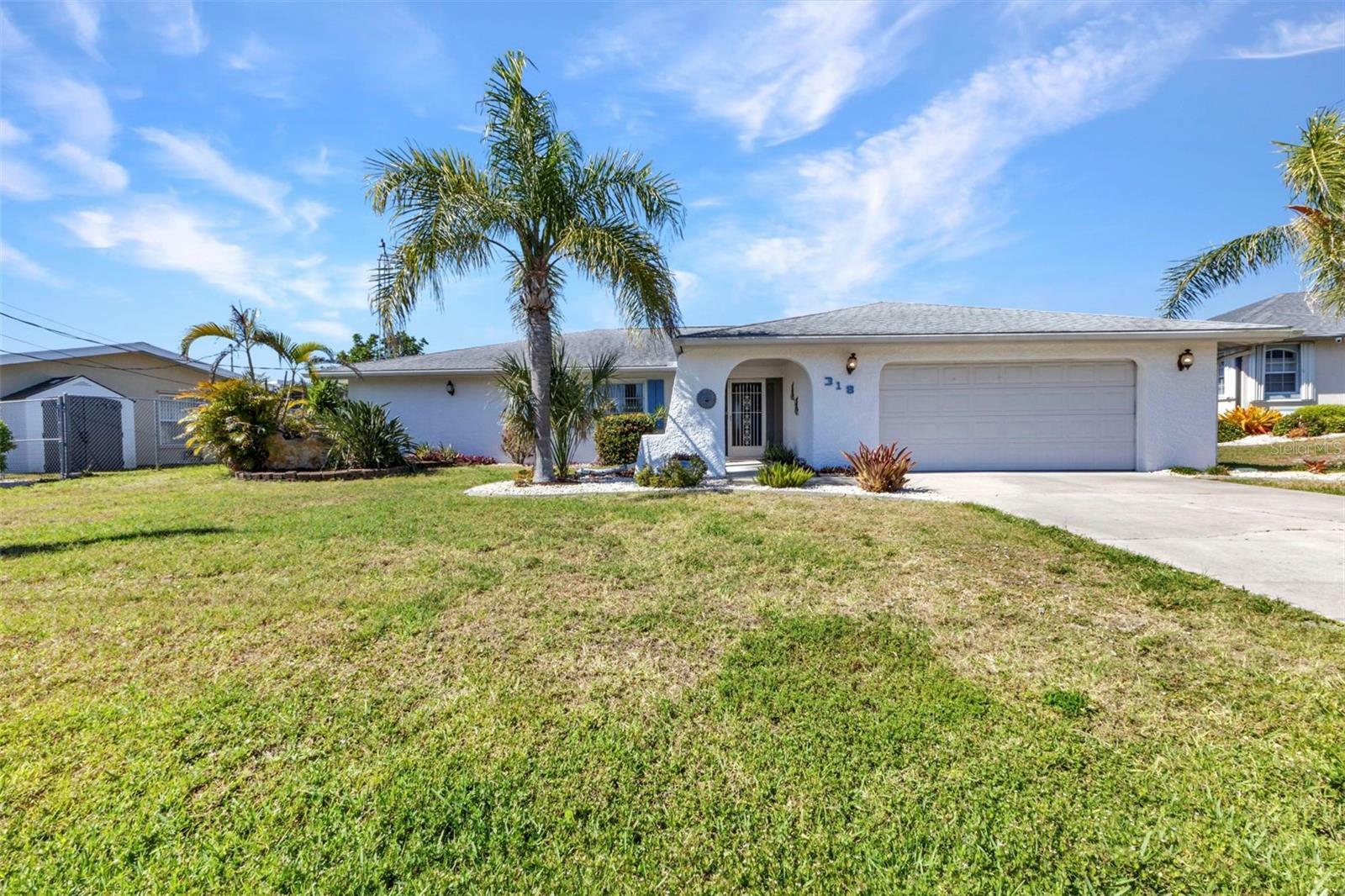 Property Photo: 318 Spring Lake Boulevard NW FL 33952