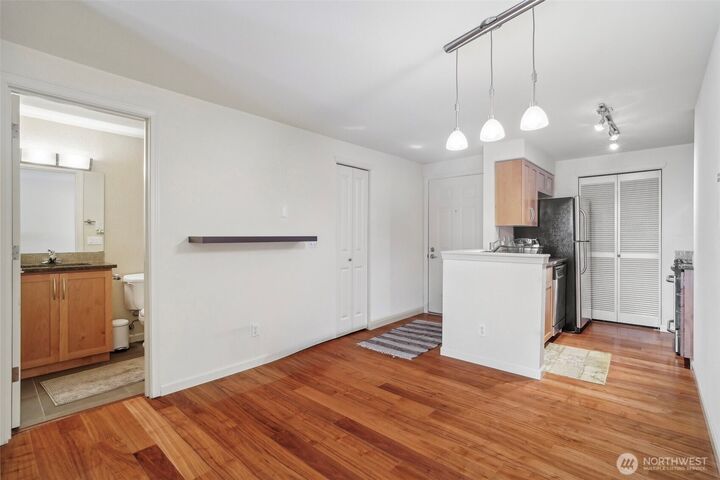 Property Photo:  3045  20th Avenue W 208  WA 98199 