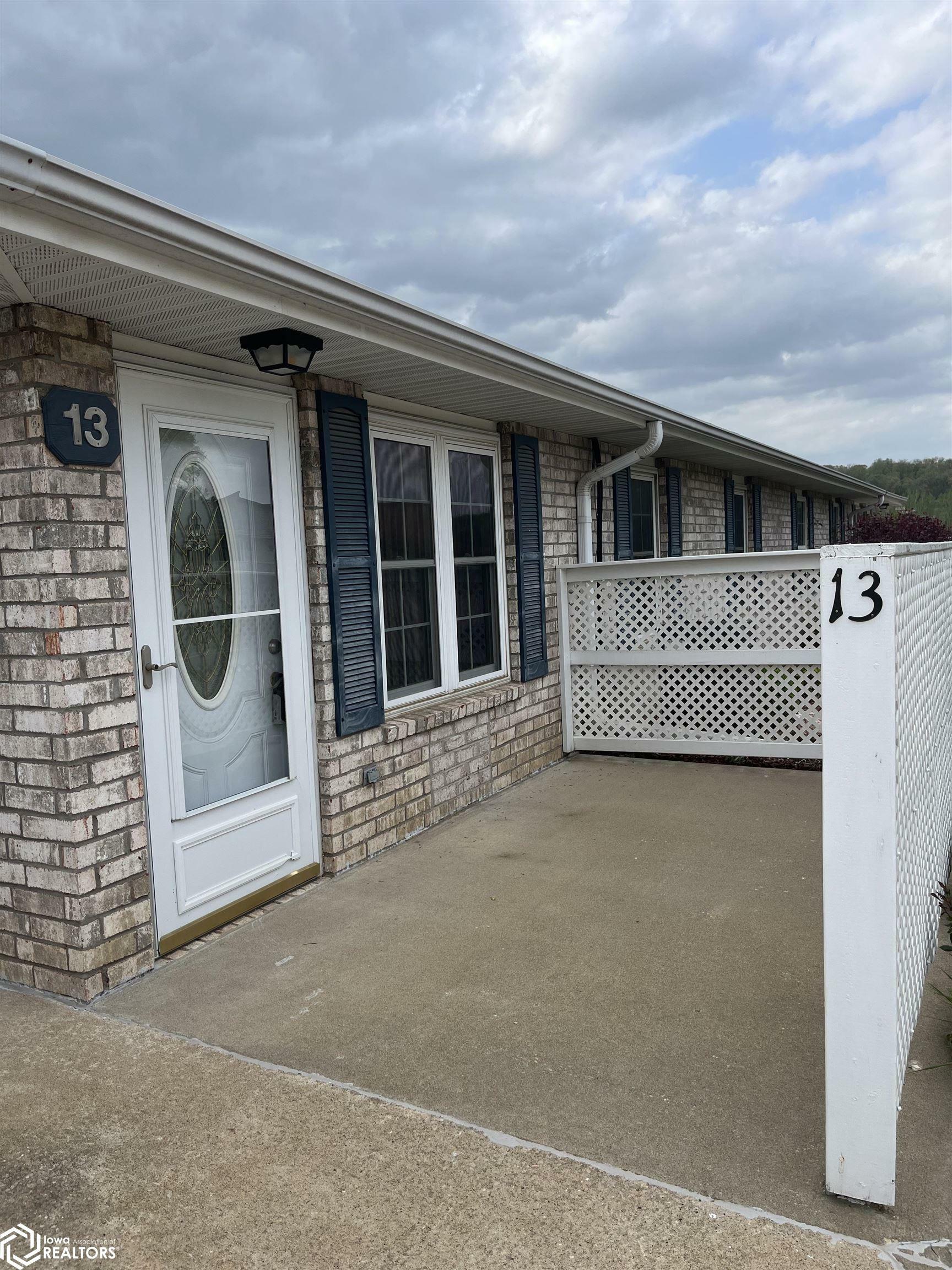 Property Photo: 1123 48th Street 13 IA 52627