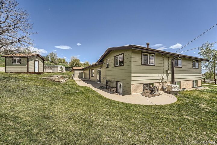 Property Photo: 13805 W 82nd Avenue CO 80005