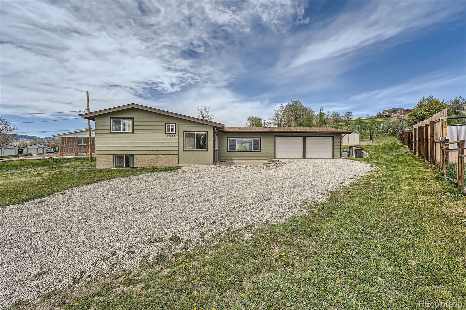 Property Photo: 13805 W 82nd Avenue CO 80005