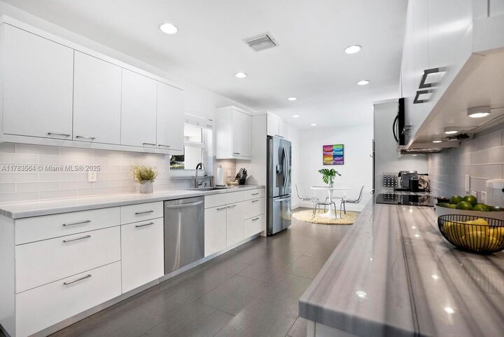 Property Photo:  13605 SW 73rd Ave  FL 33158 