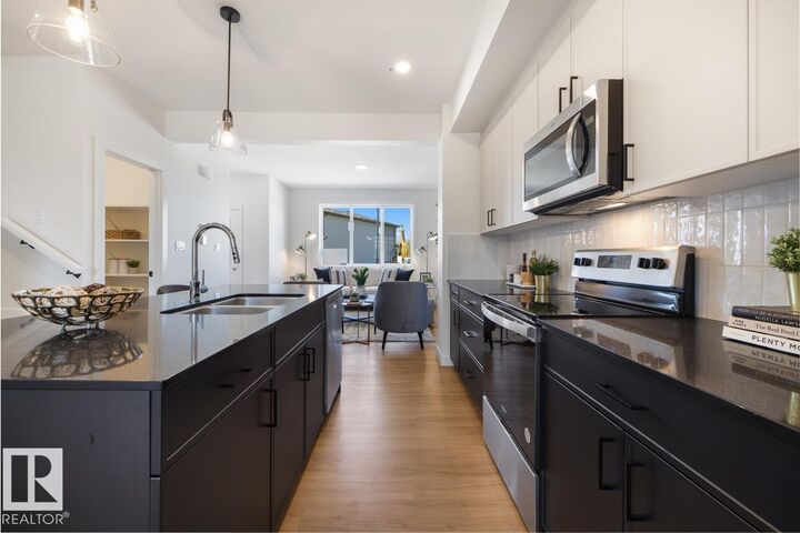 Property Photo:  10241 92A Avenue  AB T8R 1A0 