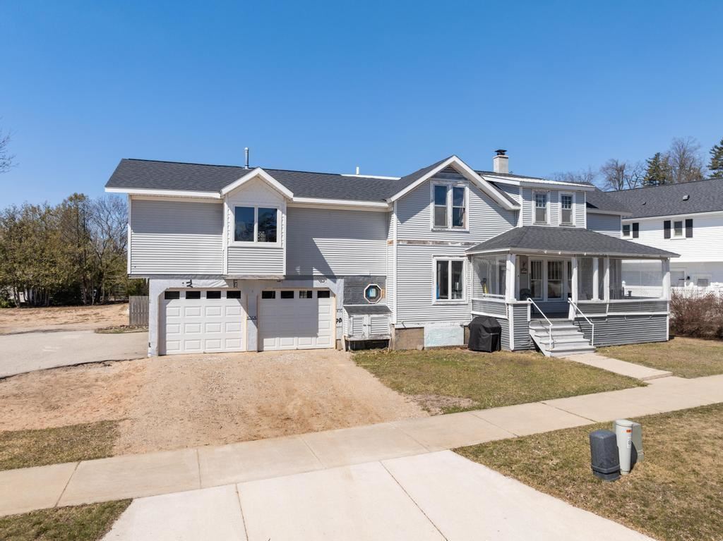 Property Photo: 181 Zoll 588 E Main St &Amp 161 Zoll St MI 49740