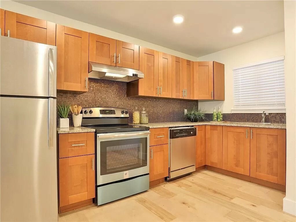Property Photo: 909 Reinli Street 111 TX 78751