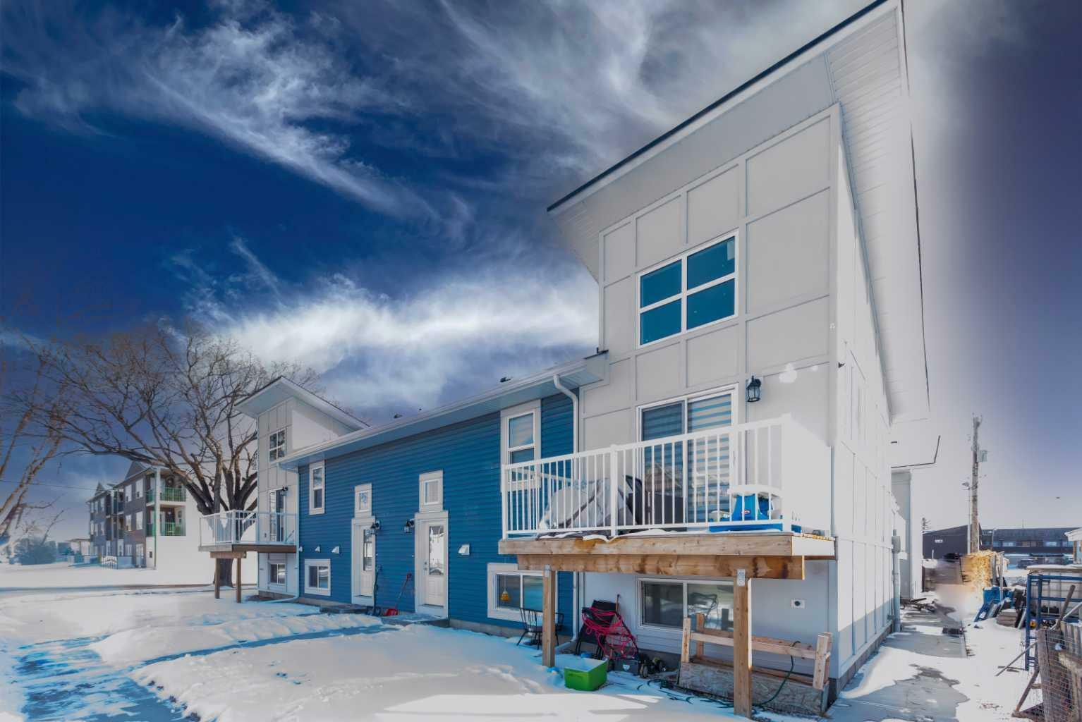 Property Photo: 41 7 Avenue SE 1 AB T1V 1E9