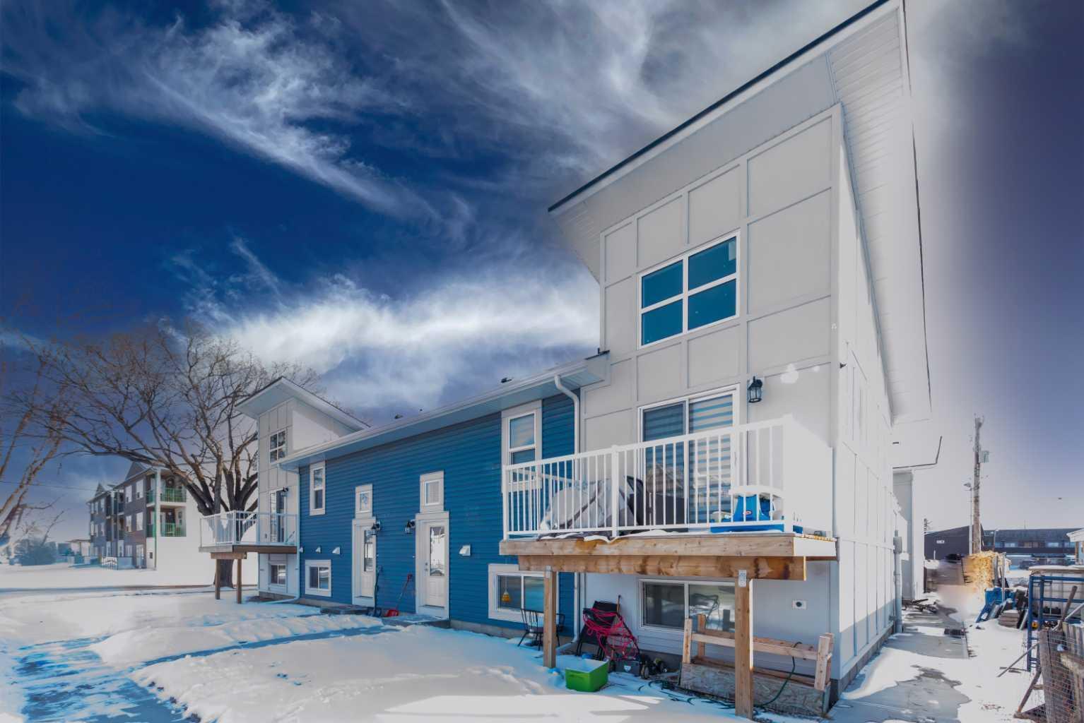 Property Photo: 41 7 Avenue SE 1 AB T1V 1E9