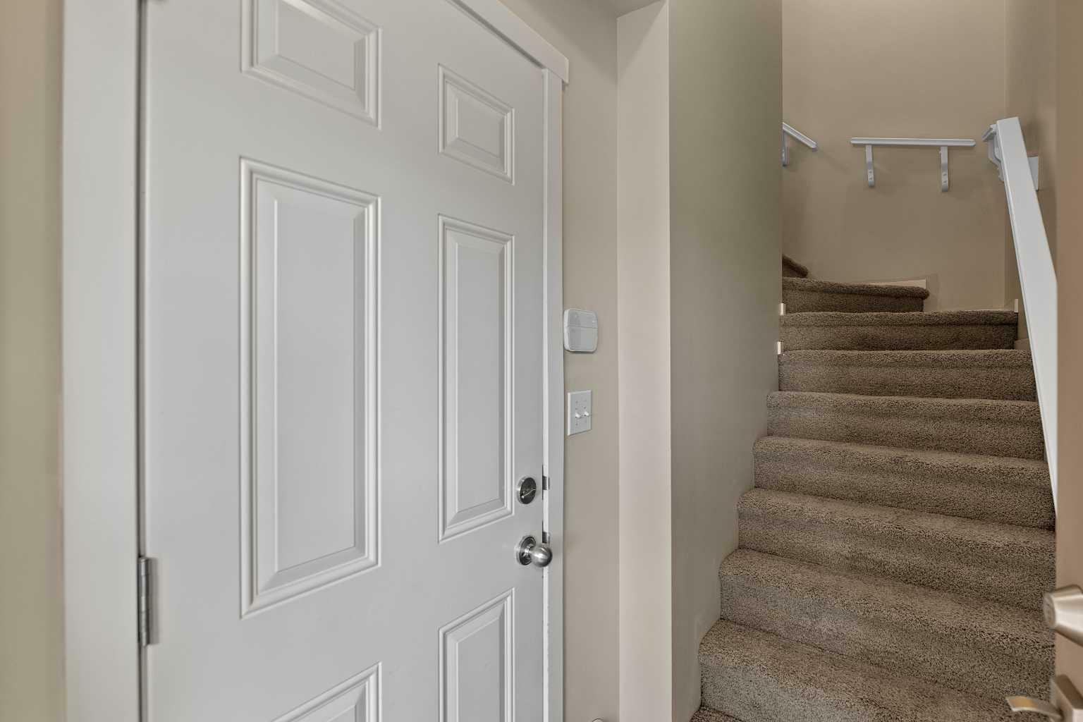 Property Photo: 125 Panatella Way NW 2302 AB T3K 0R9