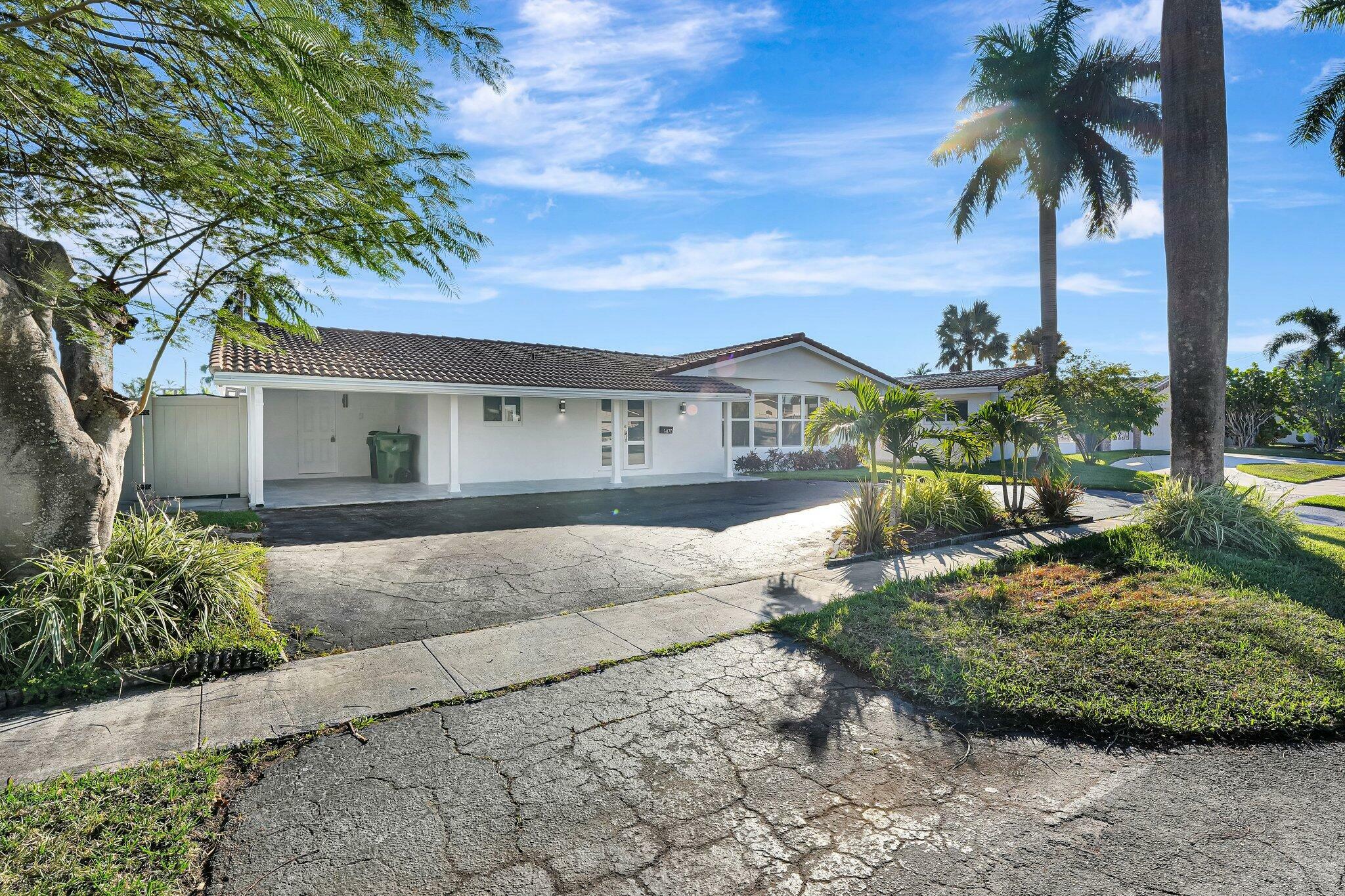 Property Photo: 1478 NE 57th Court FL 33334