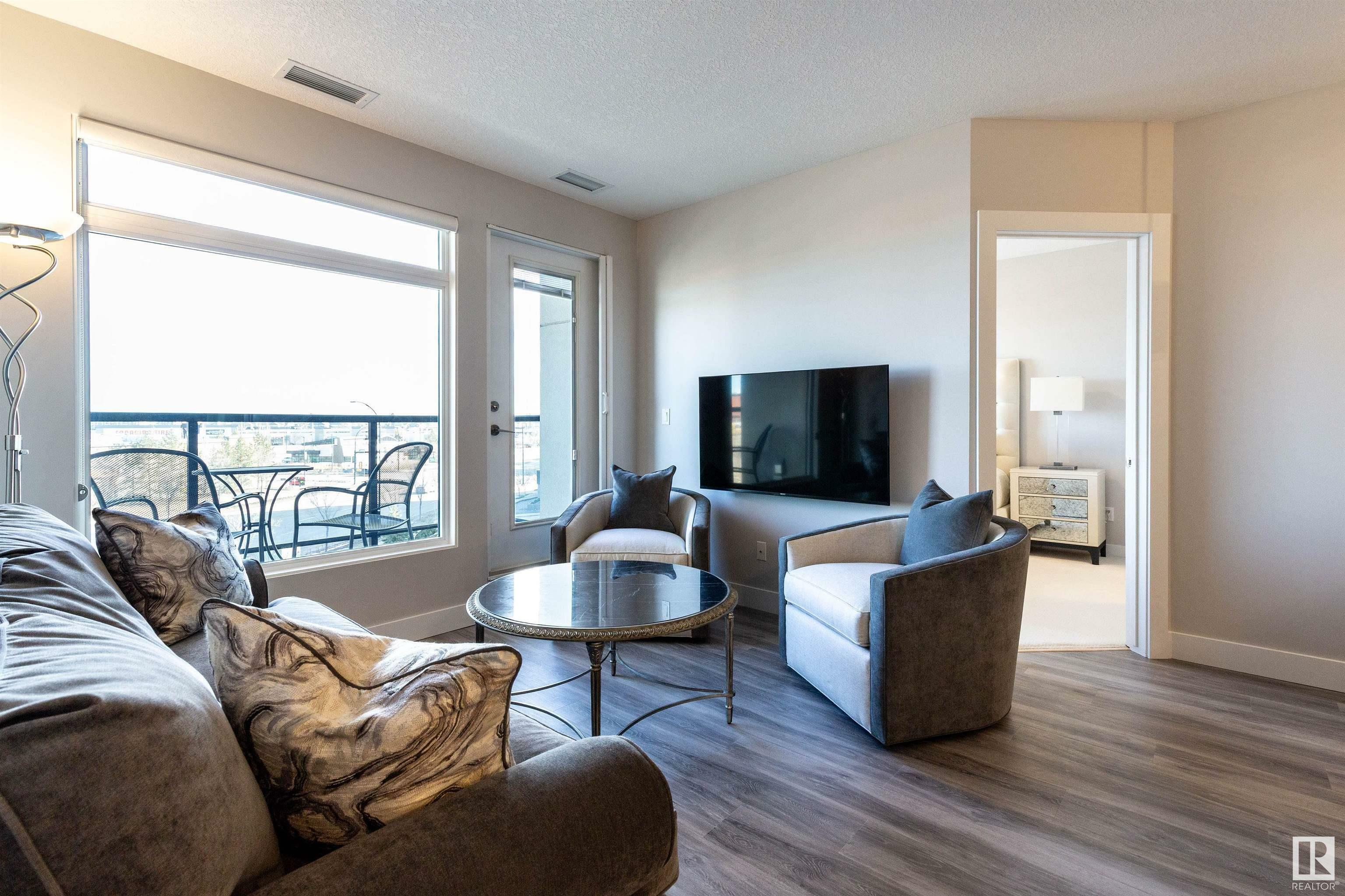 Property Photo: 5151 Windermere Boulevard SW 430 AB T6W 2K4
