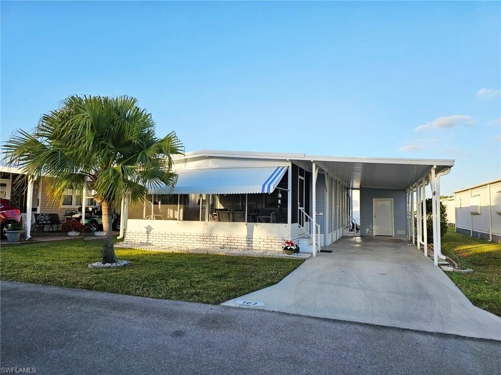 Property Photo:  102 Poinsettia Dr  FL 33905 
