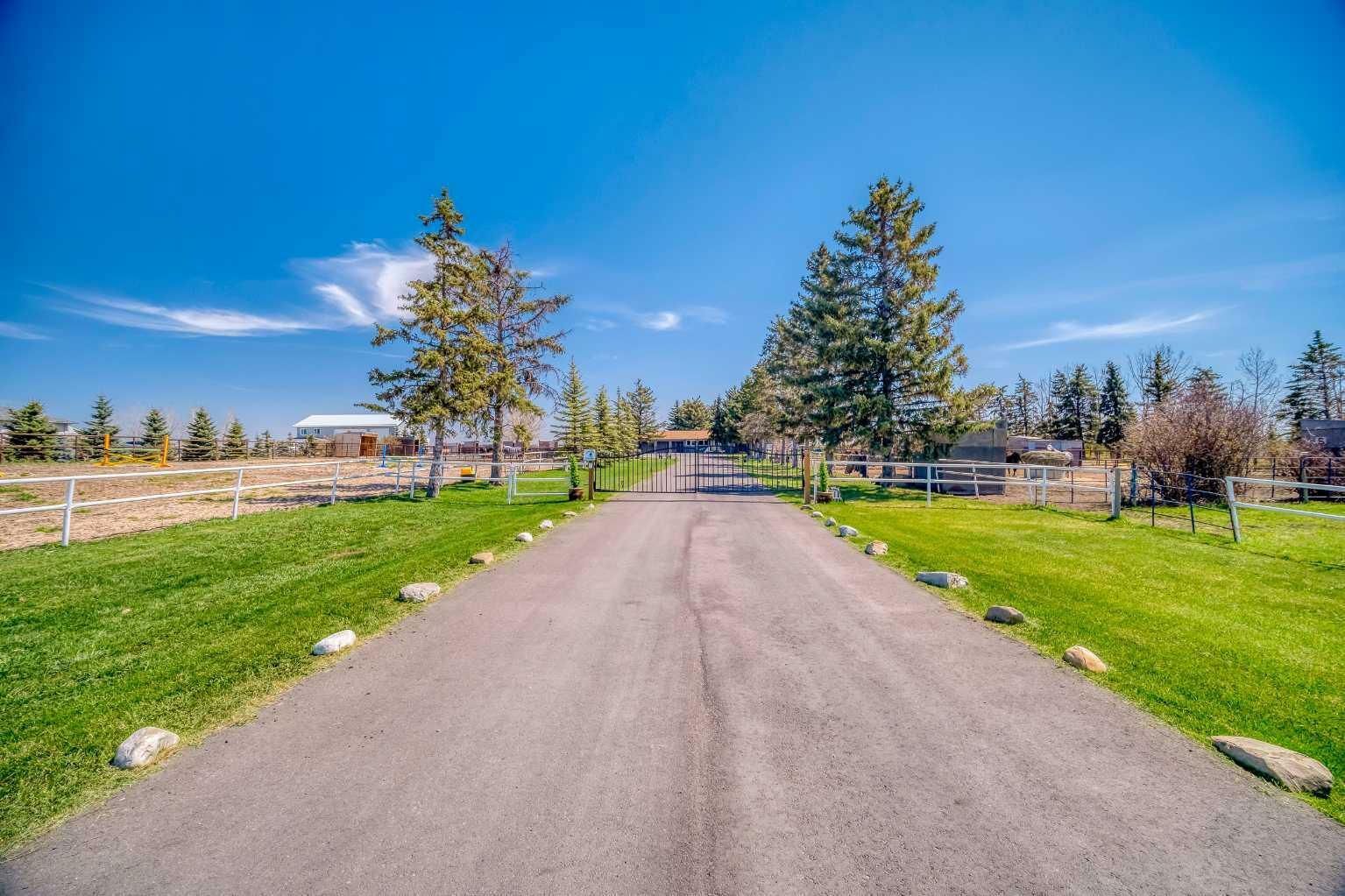 Property Photo: 354142 48 Avenue E AB T1S 0R3