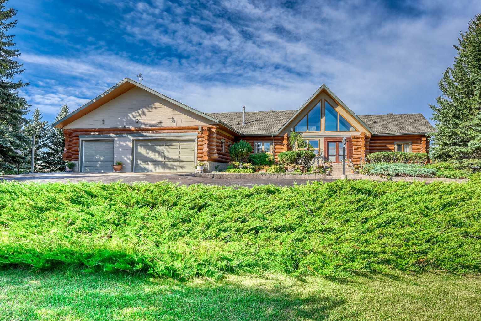 Property Photo: 226101 88 Street E AB T1S 3Y2