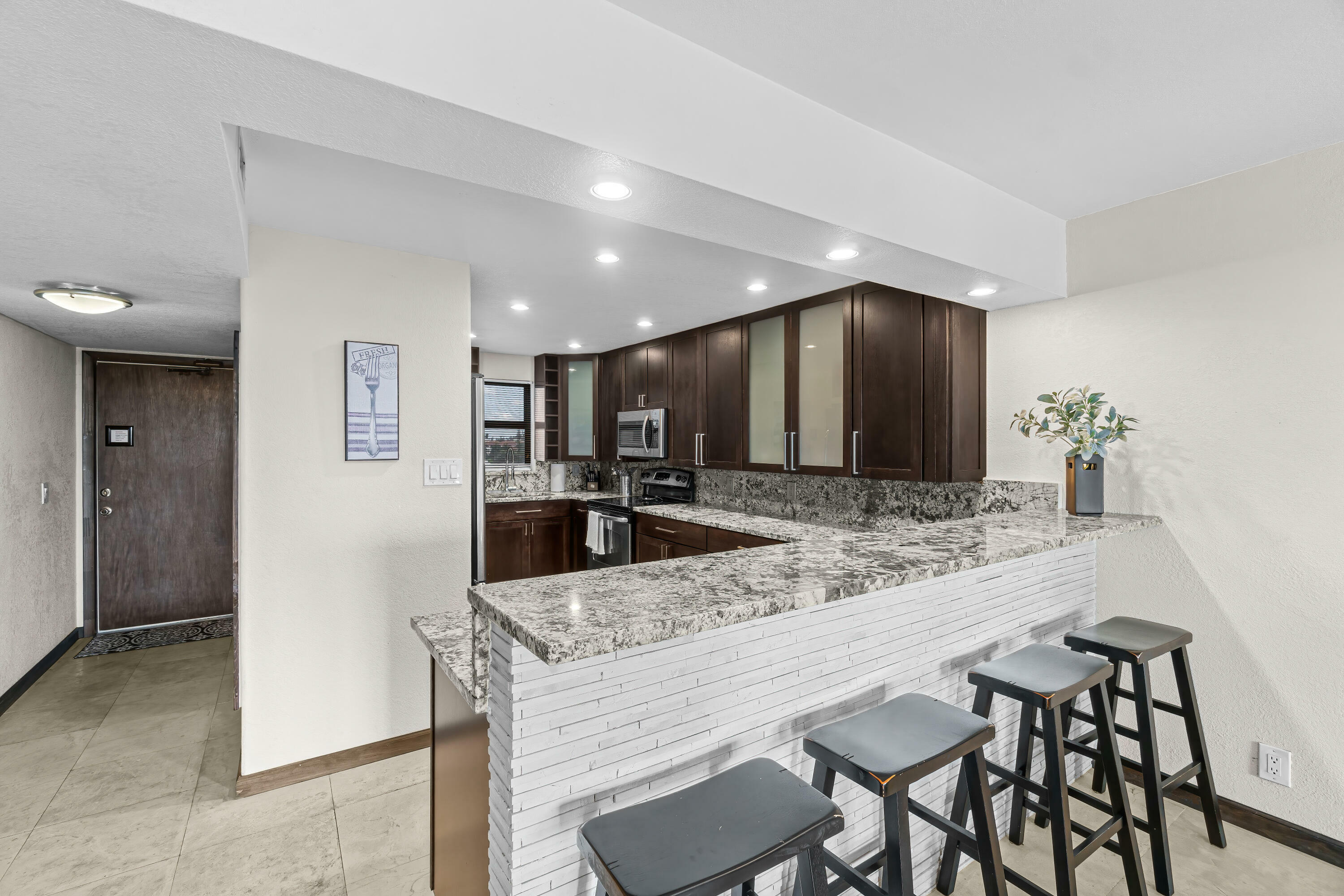 Property Photo: 2400 Deer Creek Country Club Boulevard 609-1 FL 33442