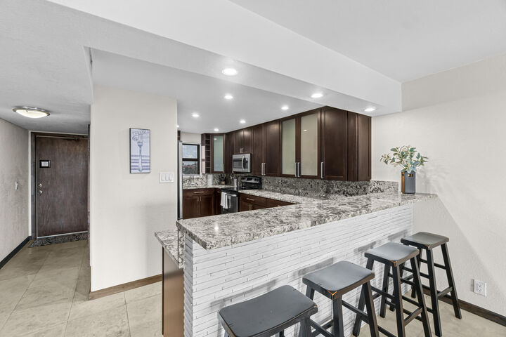 Property Photo:  2400 Deer Creek Country Club Boulevard 609-1  FL 33442 