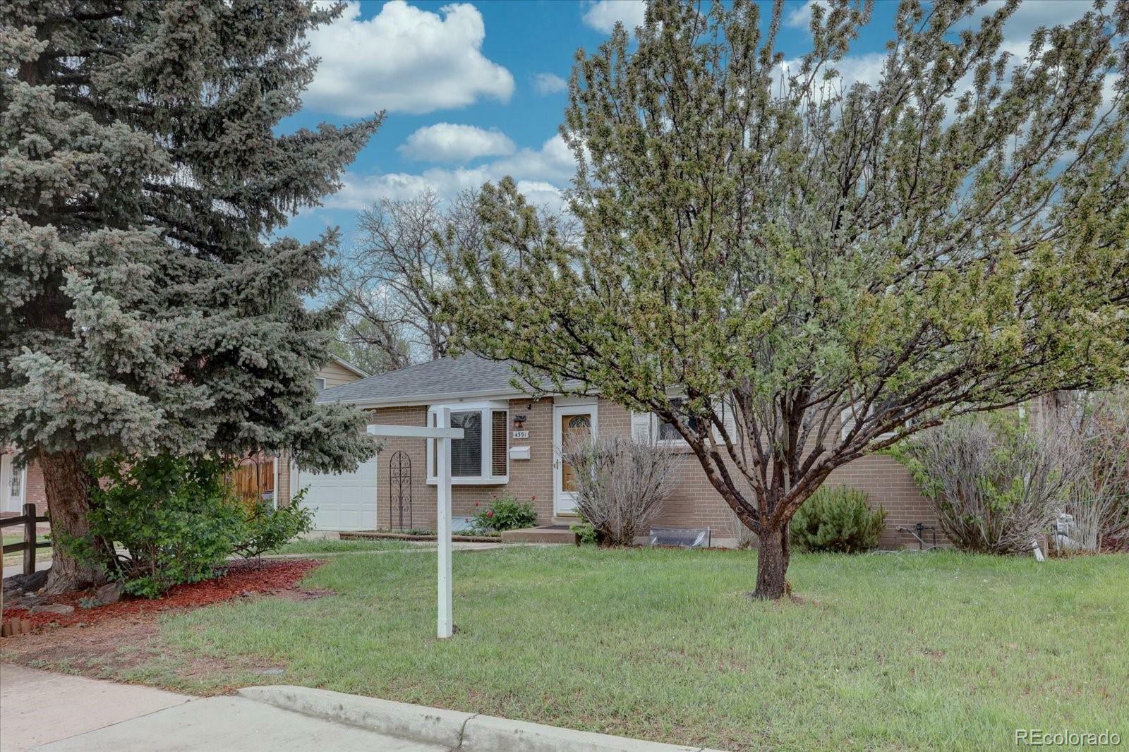 Property Photo: 4391 W Tufts Avenue CO 80236