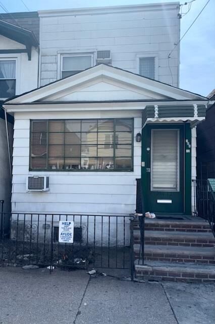 Property Photo:  104-12 38th Avenue  NY 11368 
