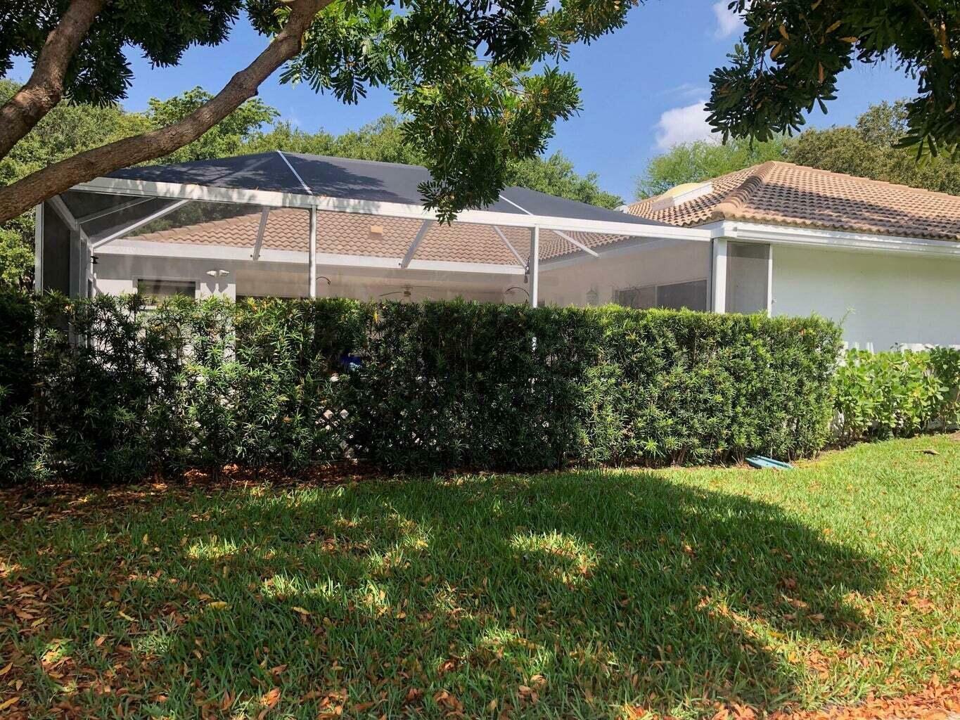 Property Photo: 6903 Geminata Oak Court FL 33410