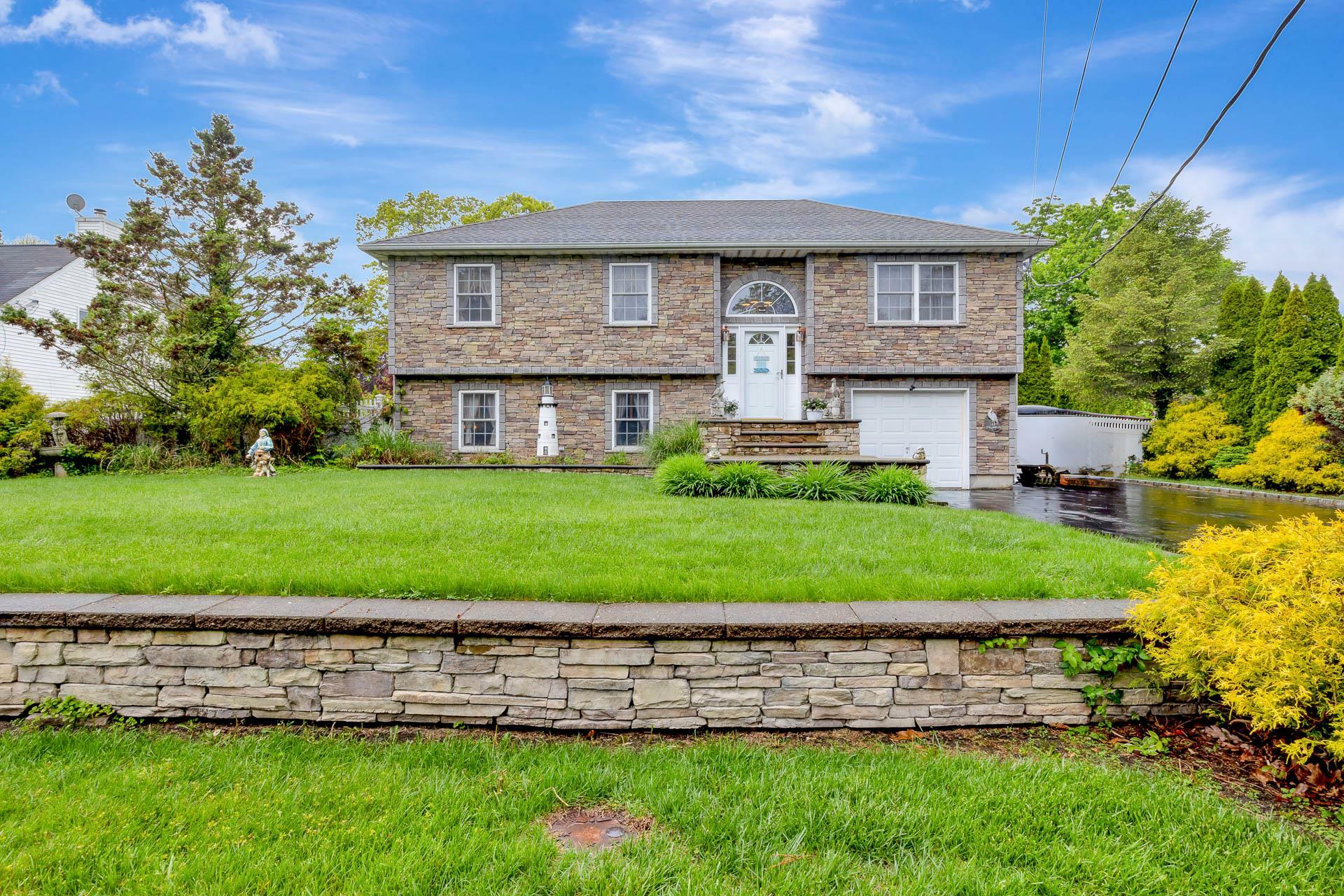 Property Photo: 102 Dahlia Drive NY 11951