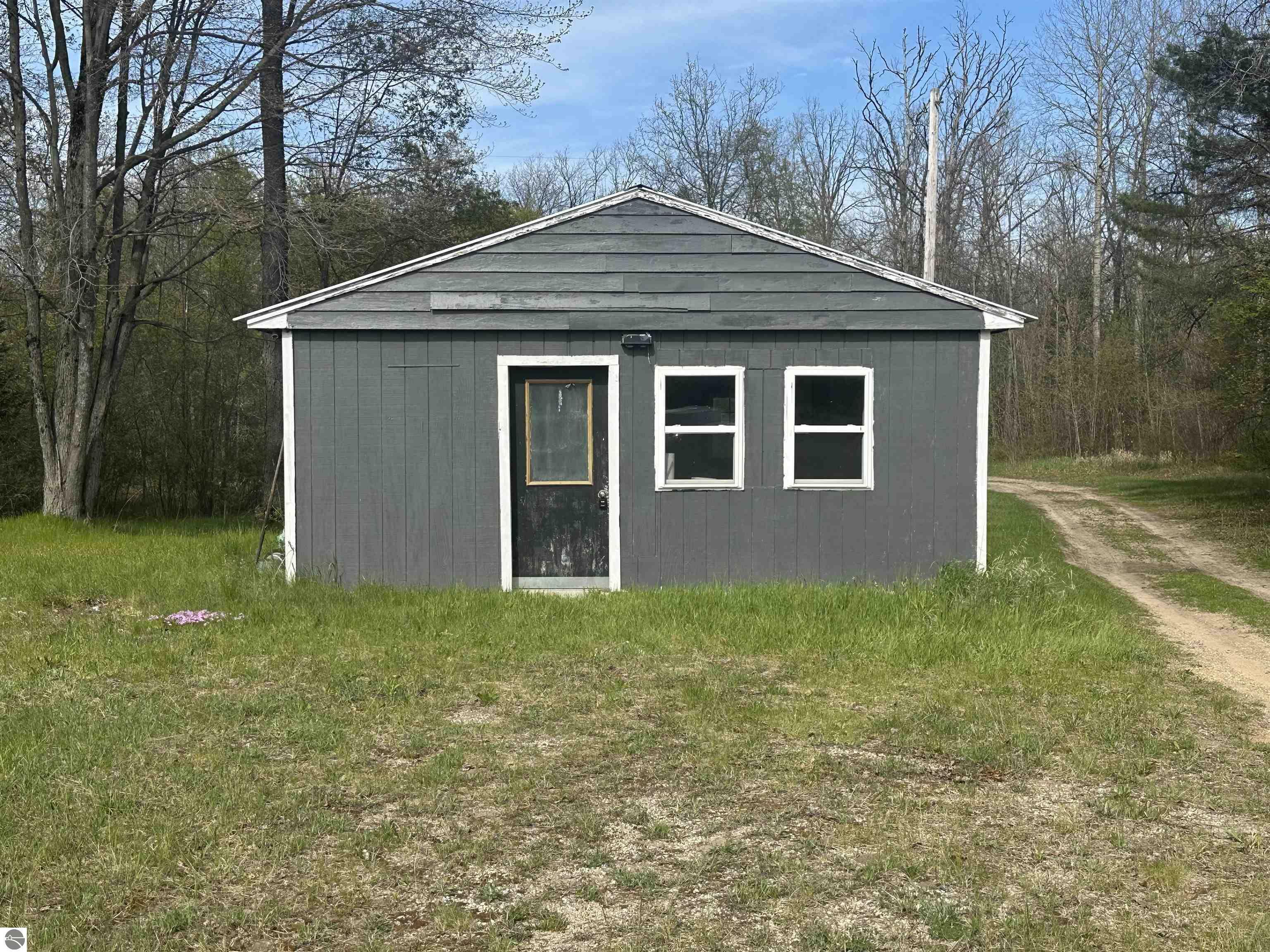 Property Photo: 13036 M-115 MI 49665