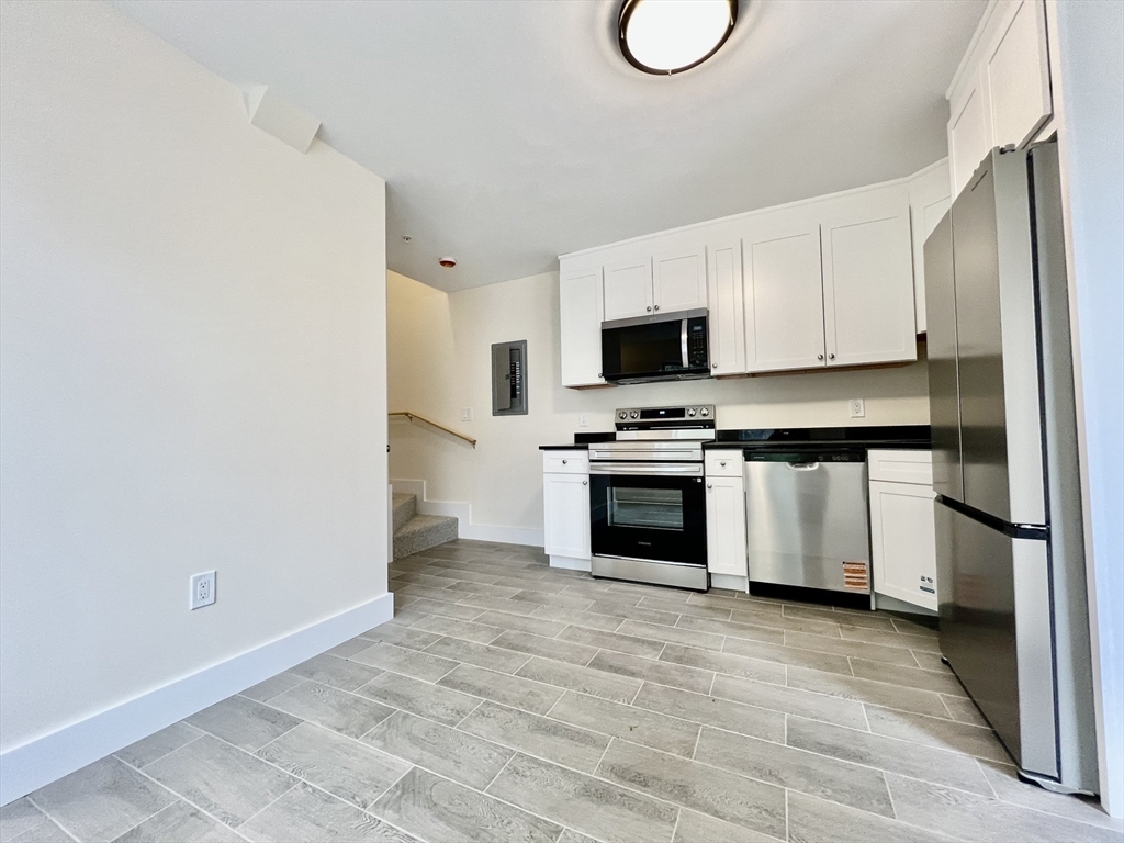 Property Photo: 13 Dalby St C MA 02458
