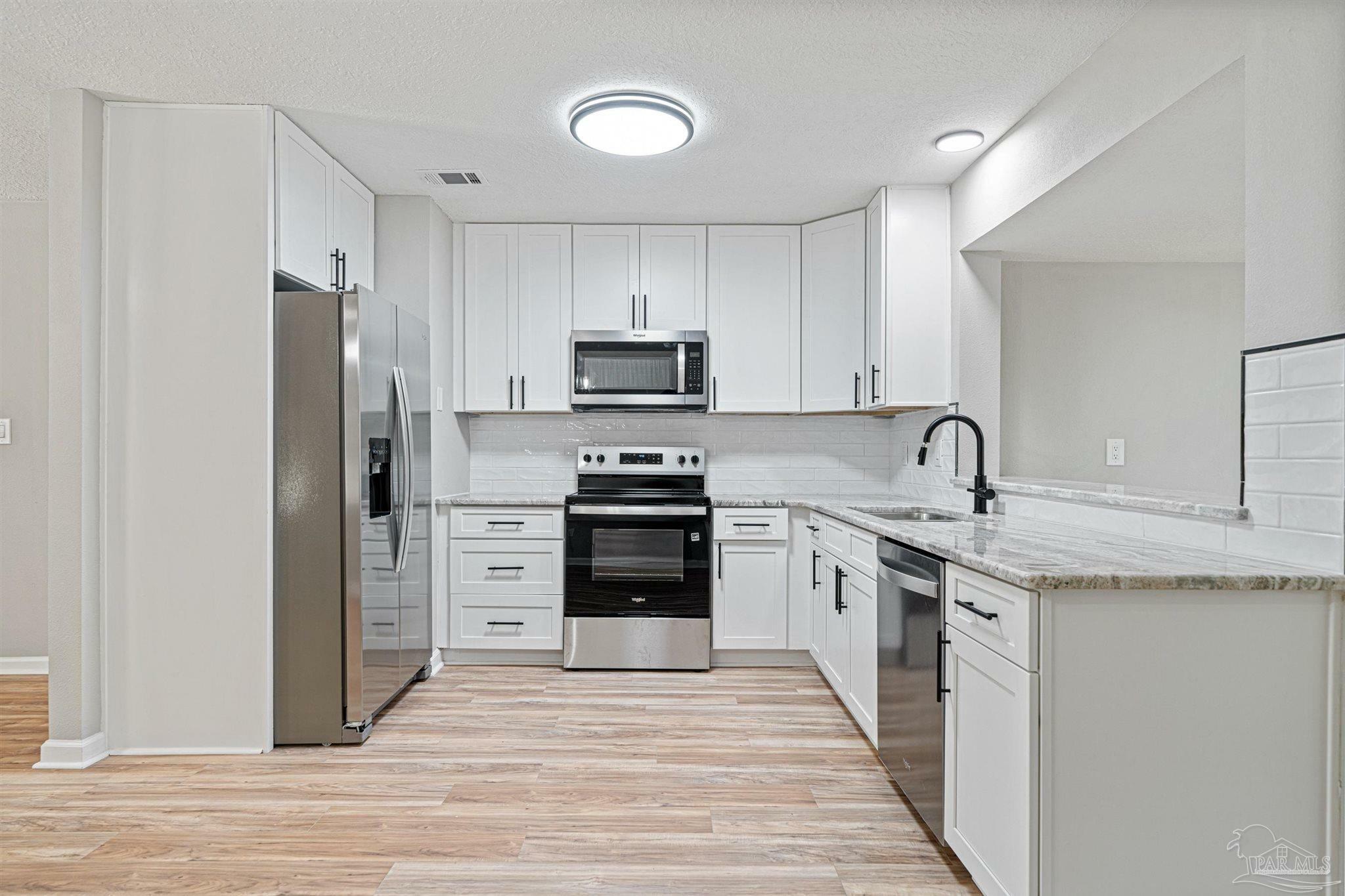 Property Photo: 7653 East Bay Blvd FL 32566
