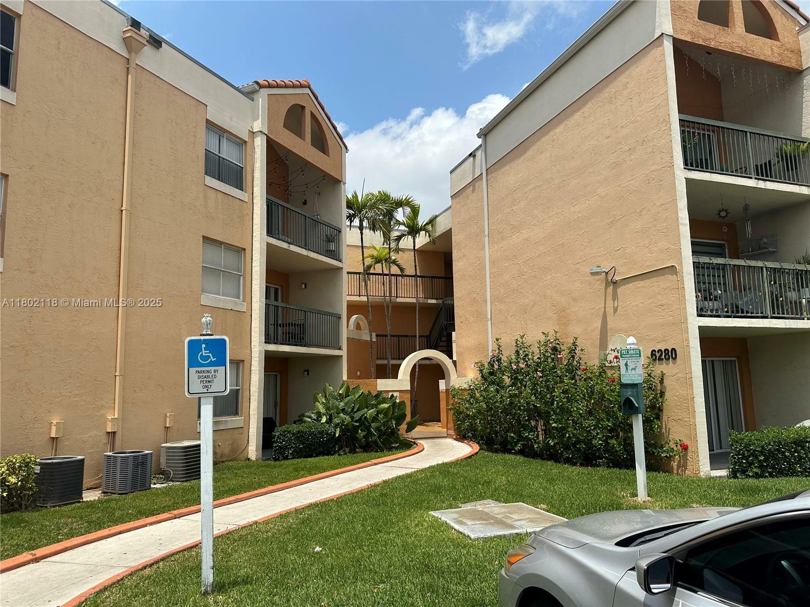 Property Photo: 6280 NW 186th St 212 FL 33015