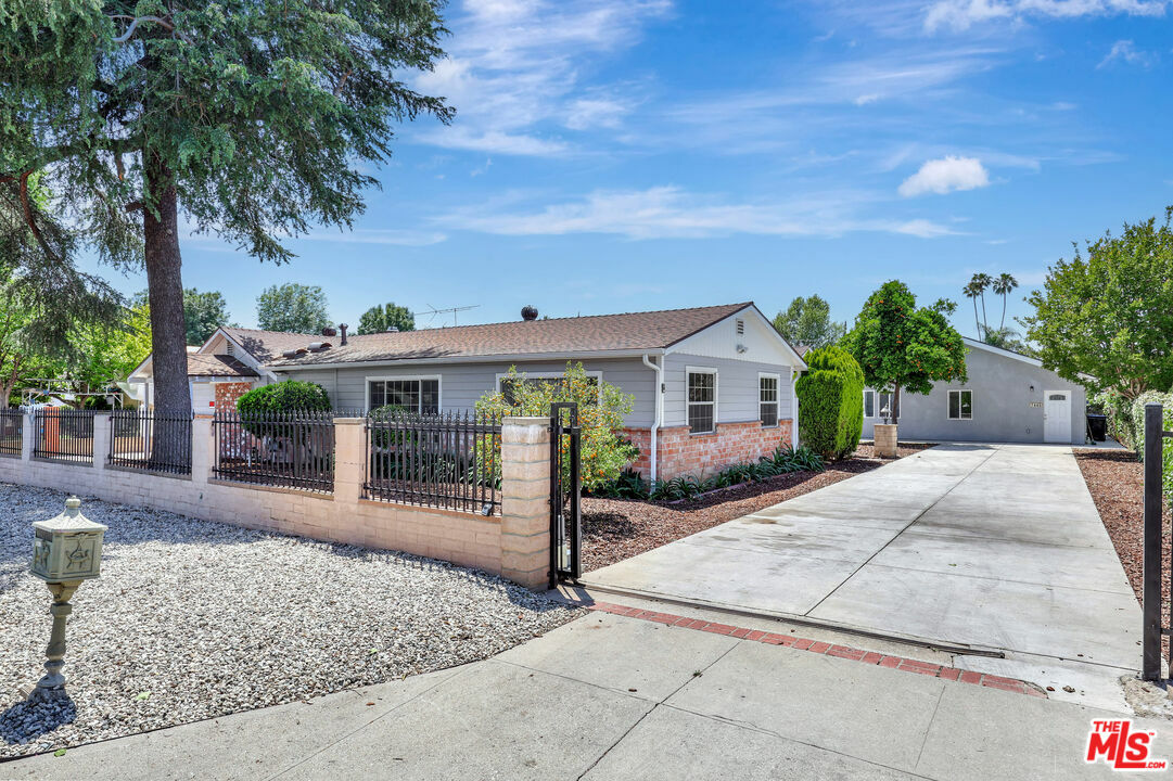 Property Photo:  7445 Balcom Ave  CA 91335 