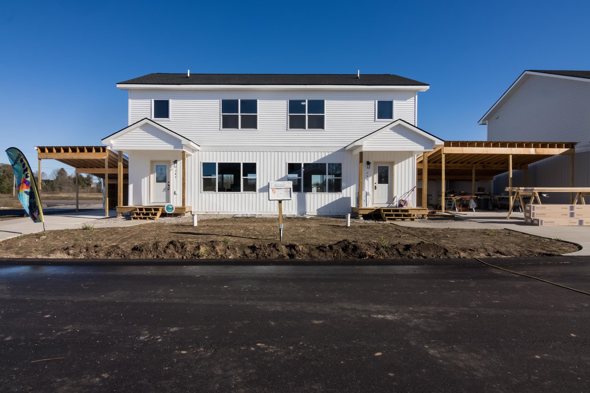 Property Photo:  202 Thrive Boulevard 15  MI 49696 