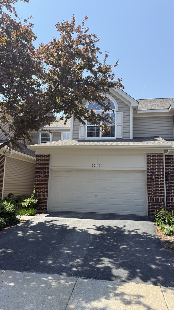 Property Photo: 1211 Townes Circle IL 60502