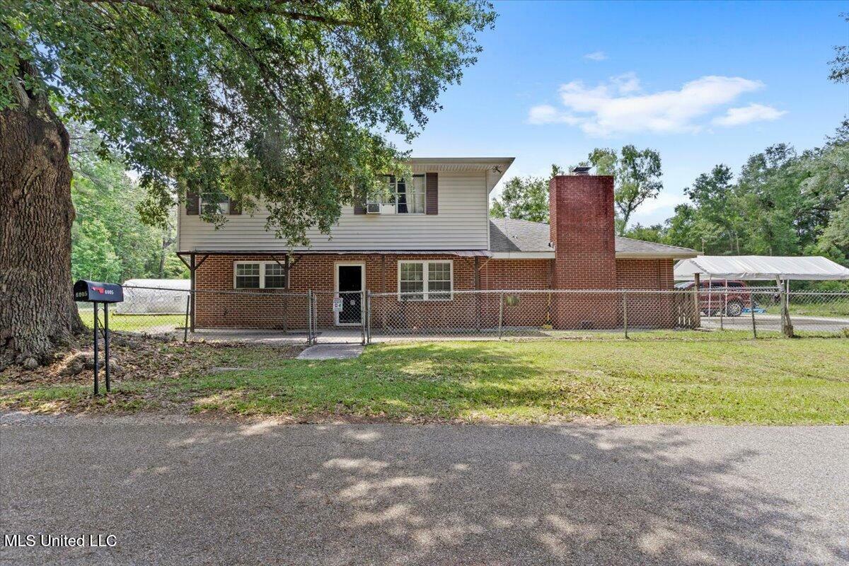 Property Photo: 6005 Cypress Drive MS 39556