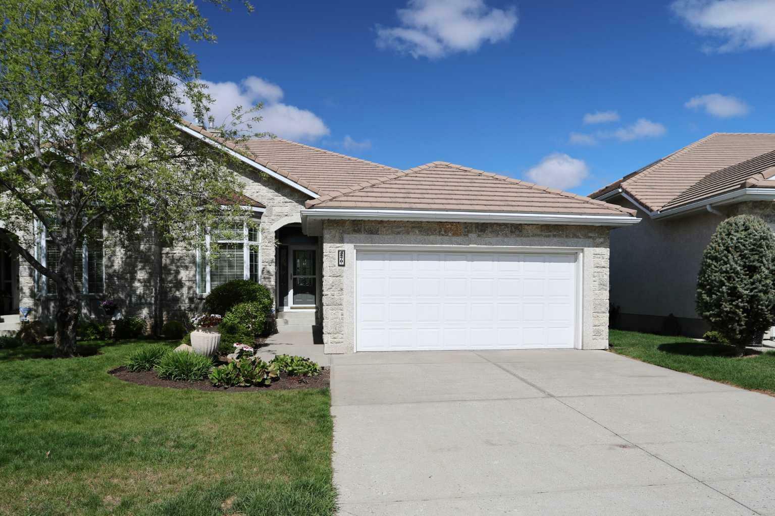 Property Photo: 4570 Hamptons Way NW AB T3A 6B6