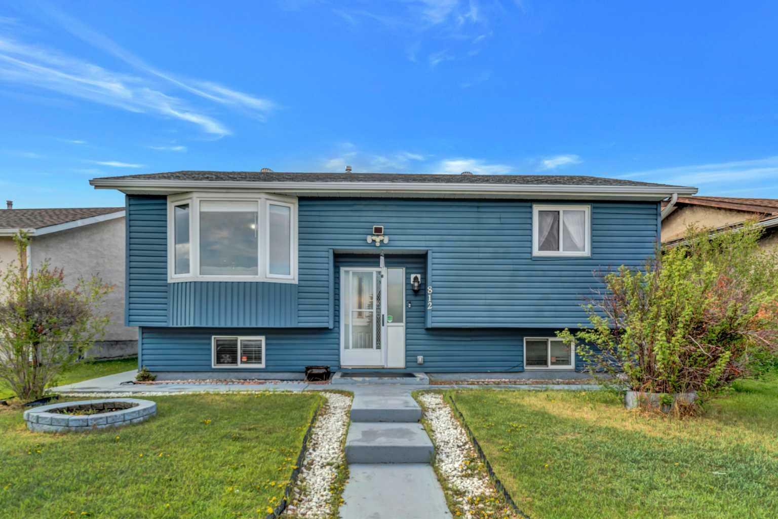 Property Photo: 812 Rundlecairn Way NE AB T1Y 2R7
