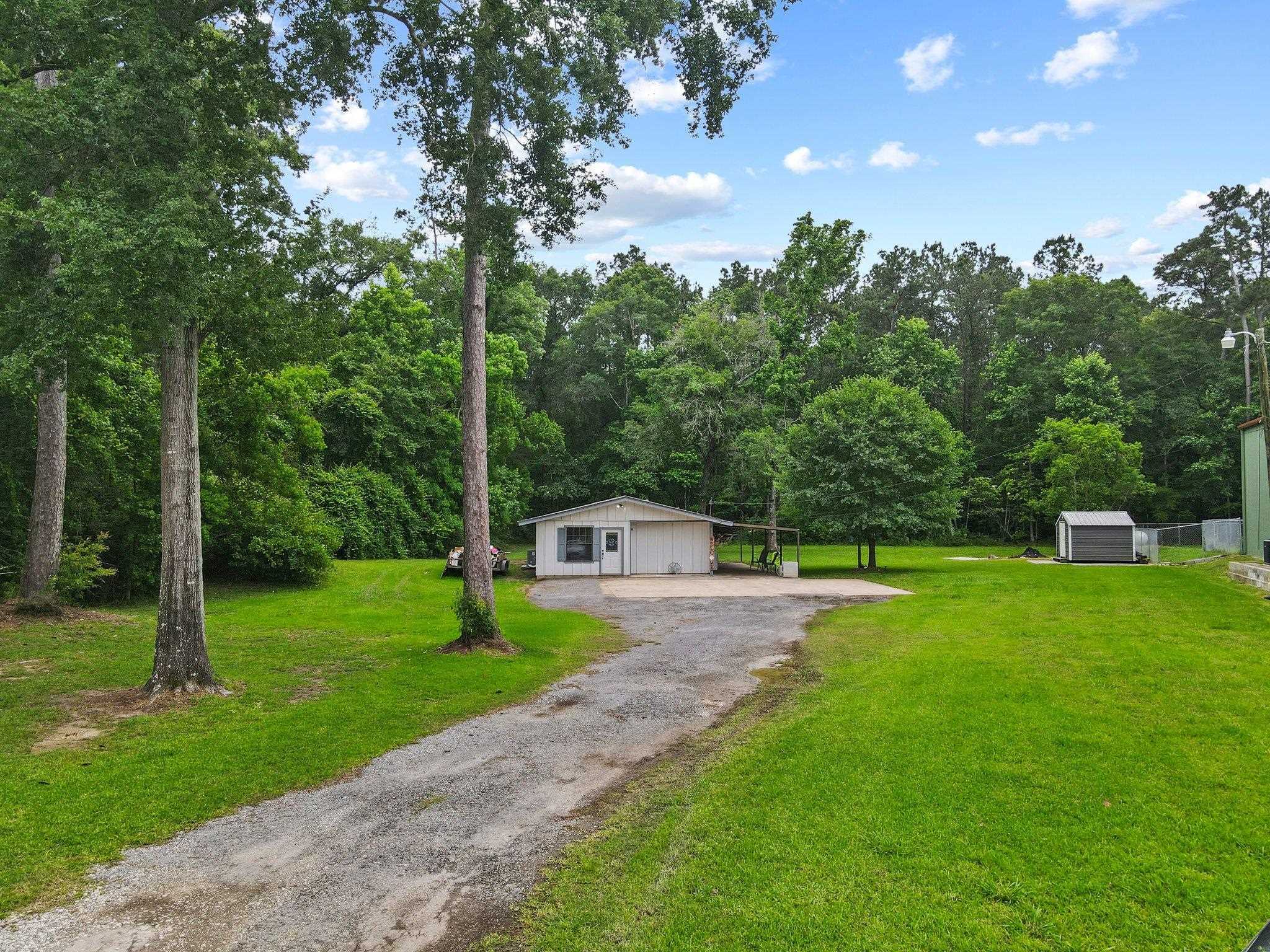 Property Photo: 166 Whispering Oak St. TX 77657