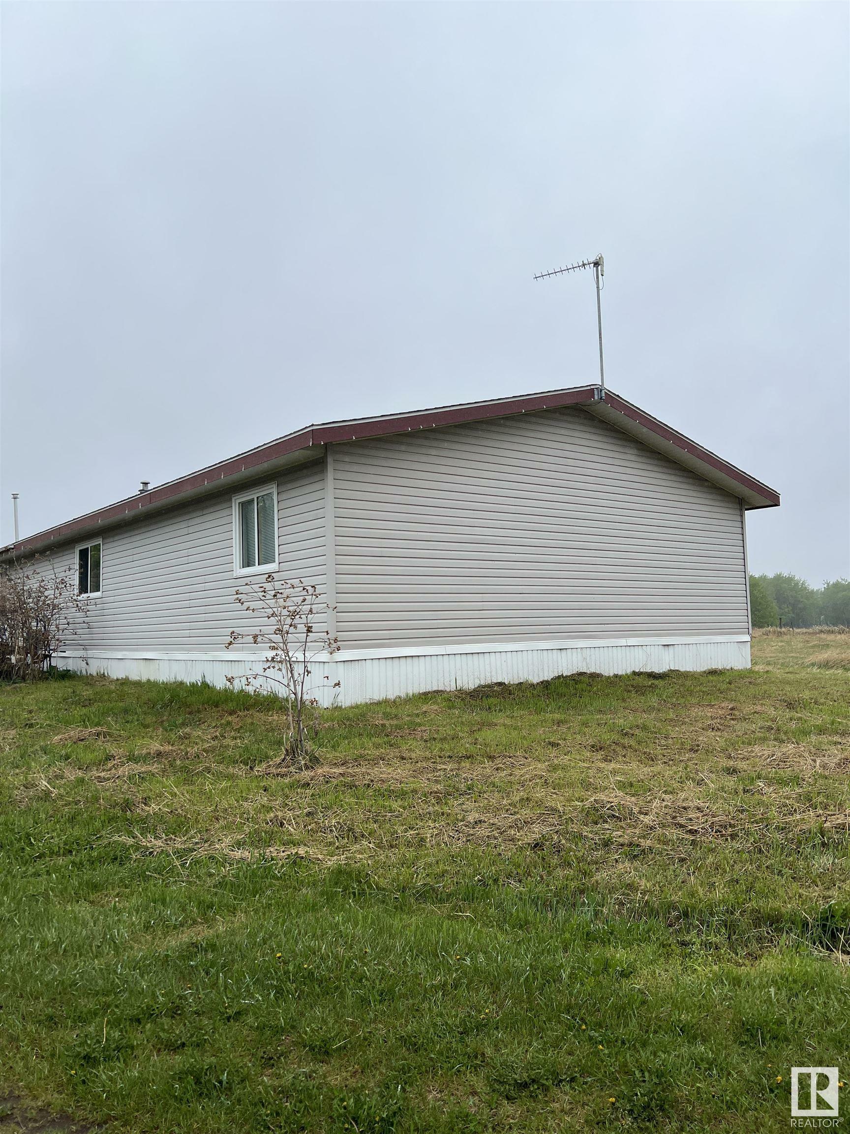 Property Photo:  14323 Township 592  AB T0A 3L0 